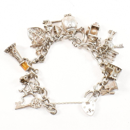455 - A collection of 925 silver jewellery. The jewellery to include a hallmarked charm bracelet with hear... 