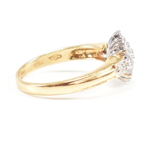 456 - A hallmarked 18ct gold and diamond cluster ring. The ring having a cluster of round cut diamonds wit... 