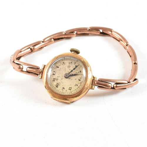 457 - A gold early 20th century ladies dress watch. Silvered dial with Arabic numeral chapter ring. Set to... 