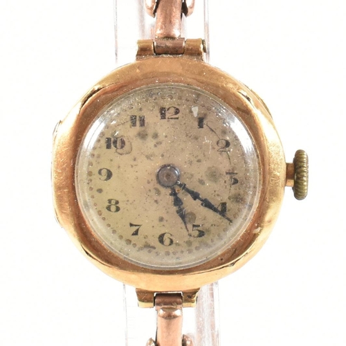 457 - A gold early 20th century ladies dress watch. Silvered dial with Arabic numeral chapter ring. Set to... 