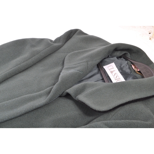 189 - Harrods - A 1990s 'Classic' full length mohair coat. A full length mohair tailcoat in bottle green w... 