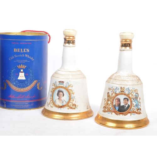 202A - Bells - A collection of five royal commemorative Bells scotch whisky bottles / decanters. The collec... 