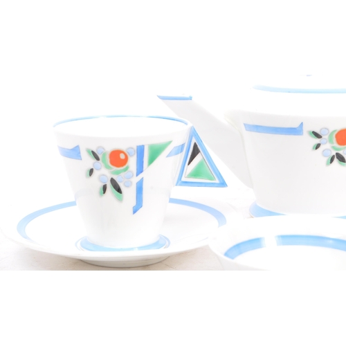 22 - Eric Slater for Shelley - An early 20th century Art Deco Shelley blue 'J' Mode part tea service. The... 