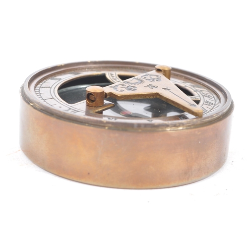 240 - A contemporary brass cased compass and sundial. The lid of the case being inscribe 'The Mary Rose, L... 