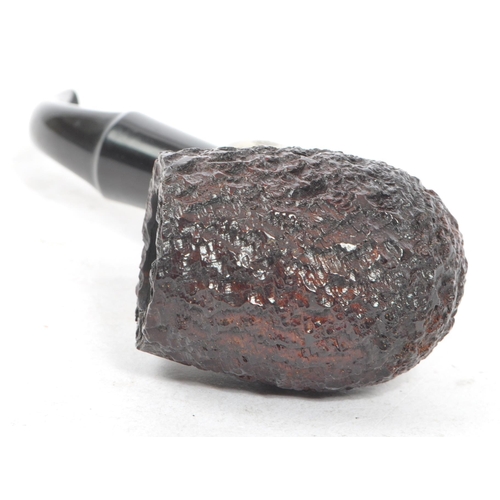 314 - A mid 20th century circa 1940s Peterson's system 357 pipe. Having marking to bottom of wooden bowl, ... 