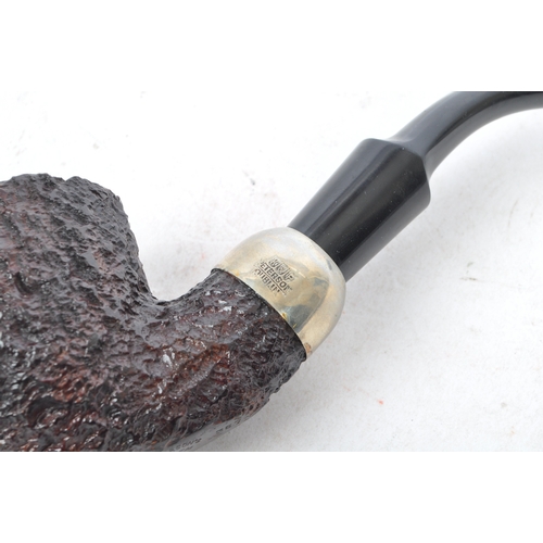 314 - A mid 20th century circa 1940s Peterson's system 357 pipe. Having marking to bottom of wooden bowl, ... 