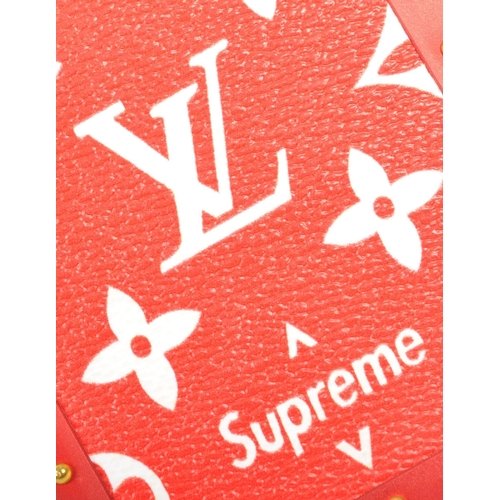 383 - A red / gold Louis Vuitton X Supreme iPhone case in original box and dust jacket.  From the 2017 Lou... 