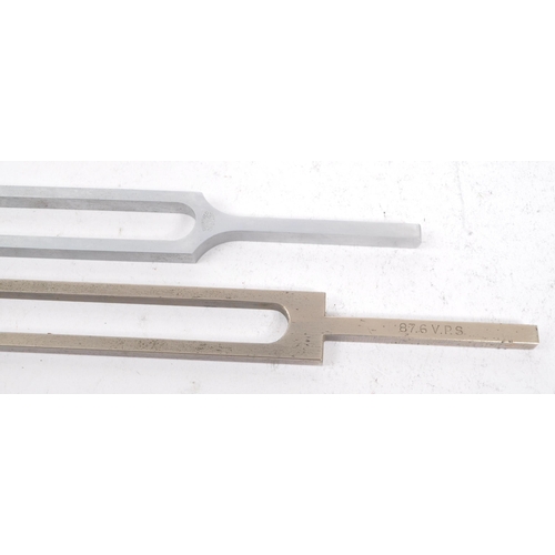 389 - Two vintage 20th century tuning forks. A acoustic resonator in the form of a two-pronged fork with t... 