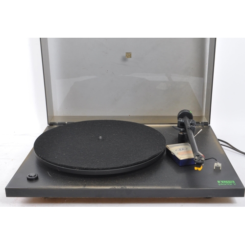 421 - Rega - A late 20th century Rega Planar 2 turntable record player, accompanied by a Rotel RA-312 Ampl... 