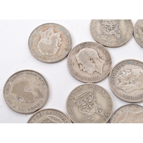 513 - A collection of approximately thirty early 20th century (pre 1947) .500 silver George V shillings. T... 