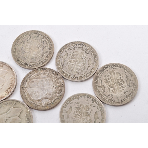 514 - A collection of five George V and three George VI circulated silver half crown coins. The lot to inc... 