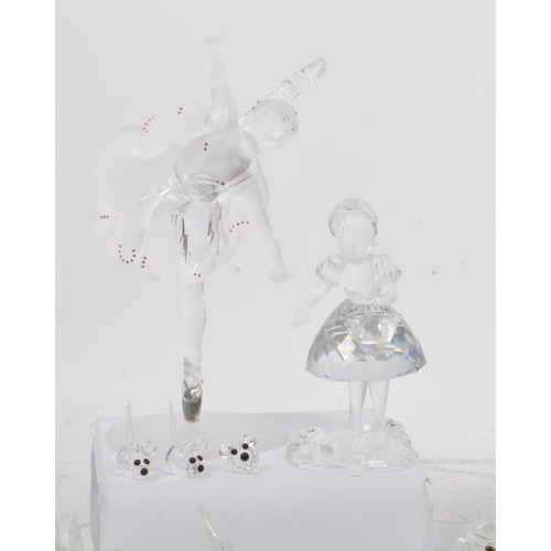 104 - Swarovski Crystal - A collection of glass crystal figures / ornaments. Comprising of mice, frogs, do... 