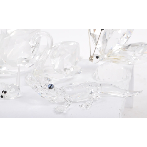 104 - Swarovski Crystal - A collection of glass crystal figures / ornaments. Comprising of mice, frogs, do... 