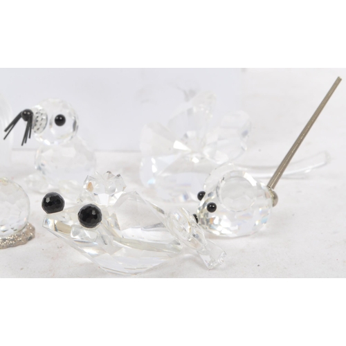 104 - Swarovski Crystal - A collection of glass crystal figures / ornaments. Comprising of mice, frogs, do... 