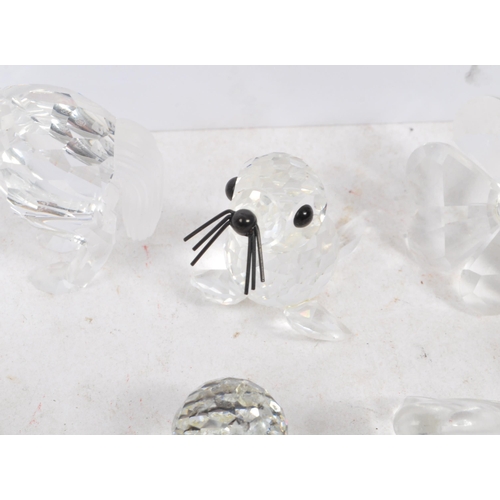 104 - Swarovski Crystal - A collection of glass crystal figures / ornaments. Comprising of mice, frogs, do... 