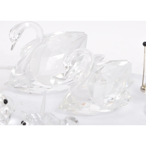 104 - Swarovski Crystal - A collection of glass crystal figures / ornaments. Comprising of mice, frogs, do... 