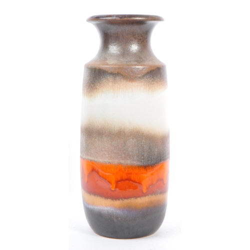 108 - A mid 20th century West German pottery vase. The vase having glaze in shades of brown, grey, and ora... 