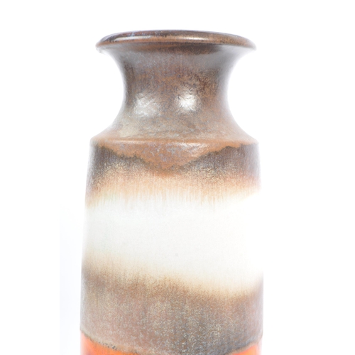 108 - A mid 20th century West German pottery vase. The vase having glaze in shades of brown, grey, and ora... 