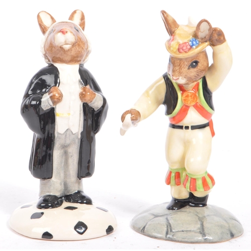 112 - Royal Doulton - Bunnykins - A collection of late 20th century porcelain china bunny figures / statue... 