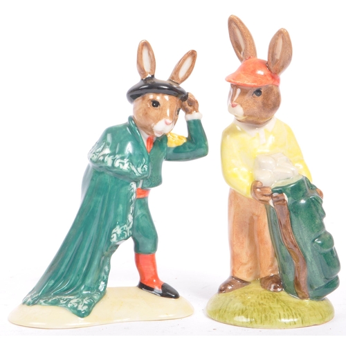 112 - Royal Doulton - Bunnykins - A collection of late 20th century porcelain china bunny figures / statue... 