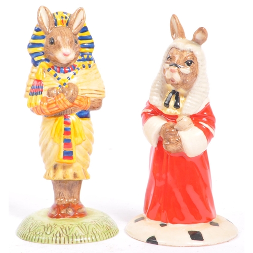 112 - Royal Doulton - Bunnykins - A collection of late 20th century porcelain china bunny figures / statue... 