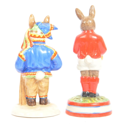 113 - Royal Doulton - Bunnykins - A collection of late 20th century porcelain china bunny figurines / stat... 