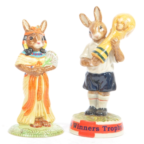 113 - Royal Doulton - Bunnykins - A collection of late 20th century porcelain china bunny figurines / stat... 