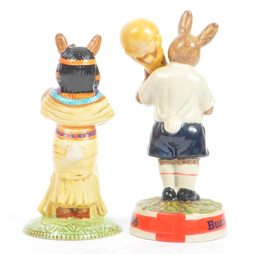 113 - Royal Doulton - Bunnykins - A collection of late 20th century porcelain china bunny figurines / stat... 