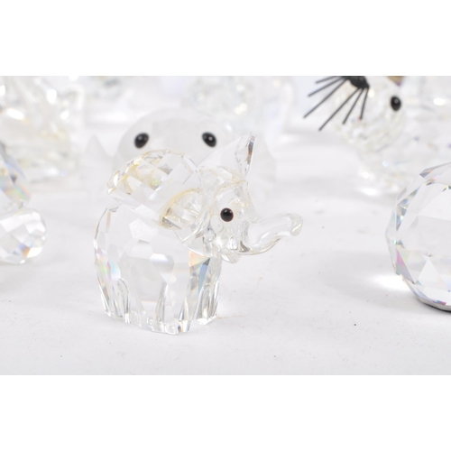 127 - Swarovski - A large collection of Swarovski crystal figures. The collection to include examples of p... 