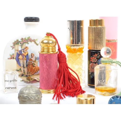 131 - A large collection of perfume and fragrance miniatures and samples. The lot to include examples such... 