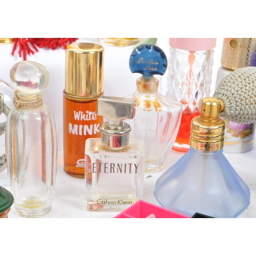 131 - A large collection of perfume and fragrance miniatures and samples. The lot to include examples such... 