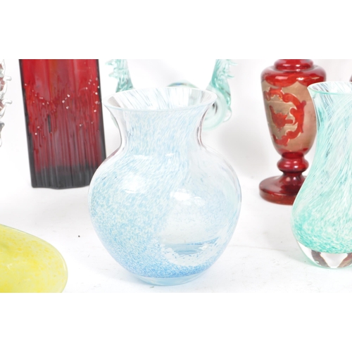 138 - A collection of mid 20th century European art glass, including examples of Bohemian glass and Romani... 