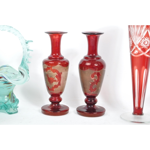 138 - A collection of mid 20th century European art glass, including examples of Bohemian glass and Romani... 