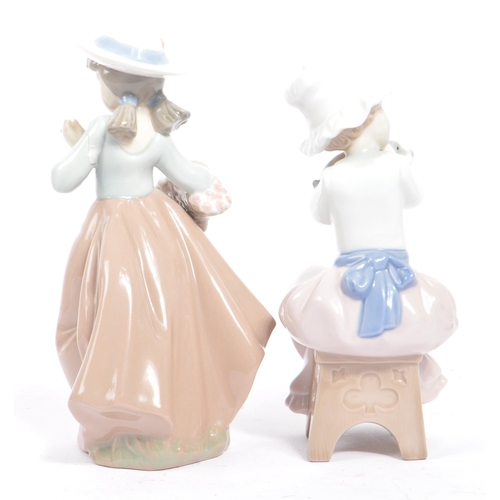 139 - A collection of five vintage ceramic Nao figures / figurines for Lladro. To include;  Three boxed fi... 