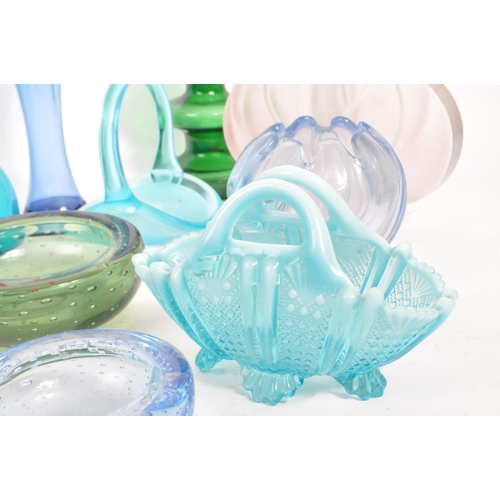 140 - A large collection of mid 20th century art glass. The collection to include a variety of examples in... 