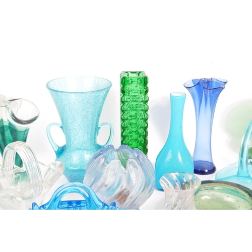 140 - A large collection of mid 20th century art glass. The collection to include a variety of examples in... 