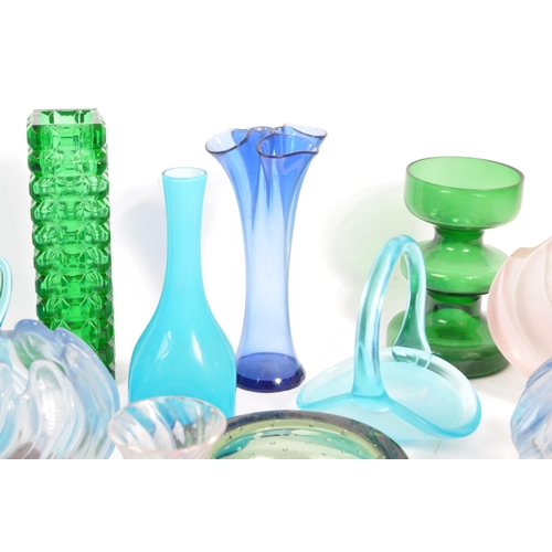 140 - A large collection of mid 20th century art glass. The collection to include a variety of examples in... 