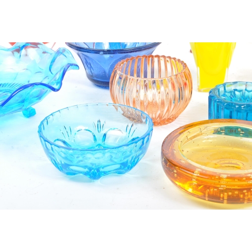 145 - A large collection of mid 20th century art glass. The collection to include a variety of glass dishe... 