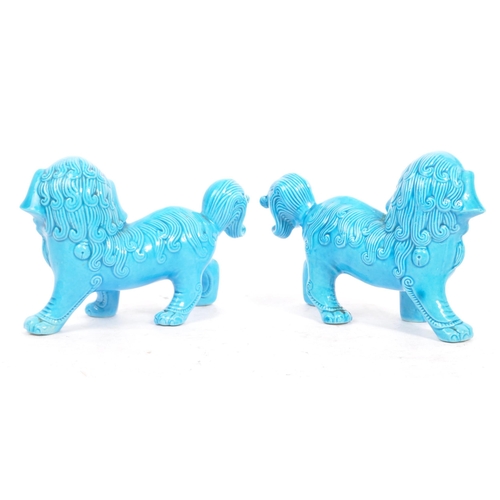 149 - A matching pair of Oriental 20th Century blue glazed ceramic Fu Dogs / Dogs of Foo figures sculpture... 