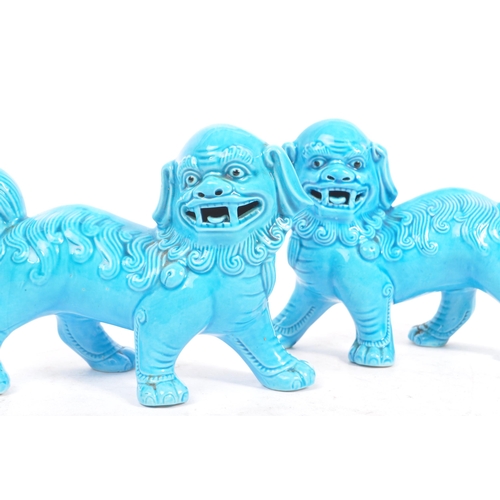 149 - A matching pair of Oriental 20th Century blue glazed ceramic Fu Dogs / Dogs of Foo figures sculpture... 