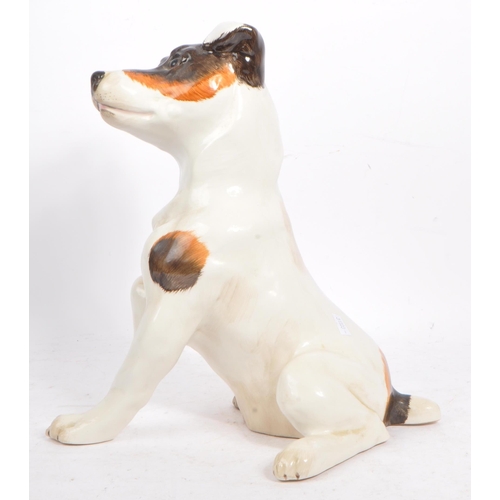 159 - Just Cats and friends - A vintage 20th century ceramic Jack Russel dog. In a seating position with p... 