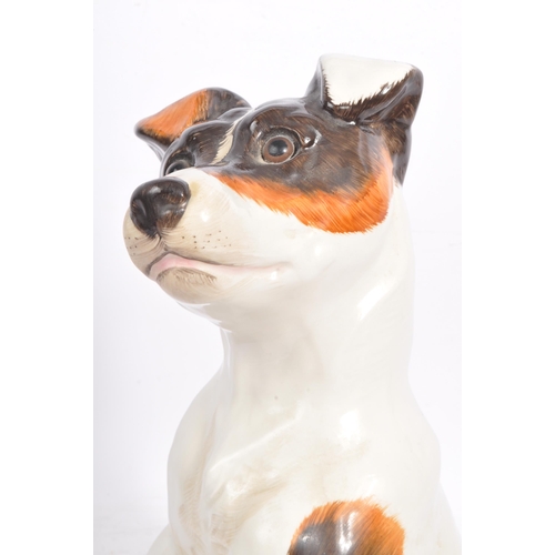 159 - Just Cats and friends - A vintage 20th century ceramic Jack Russel dog. In a seating position with p... 