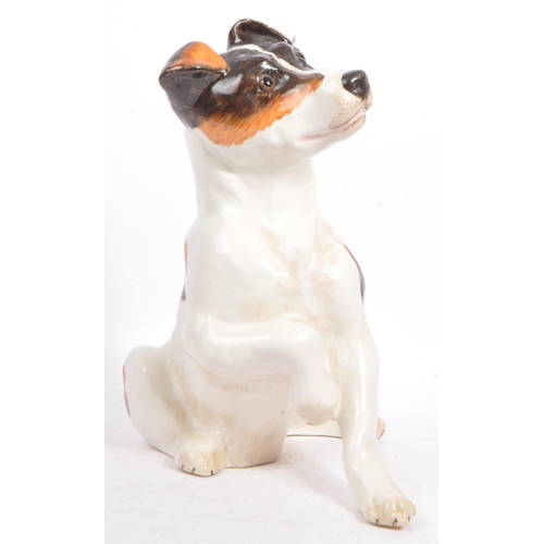 159 - Just Cats and friends - A vintage 20th century ceramic Jack Russel dog. In a seating position with p... 