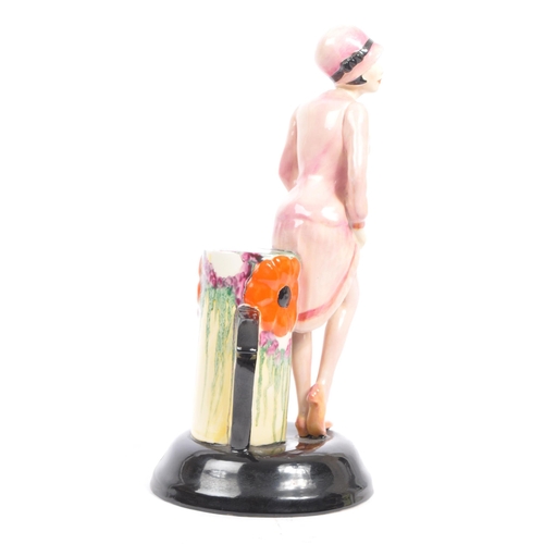 16 - A vintage late 20th century limited edition ceramic figurine of Clarice Cliff by Kevin Francis. The ... 