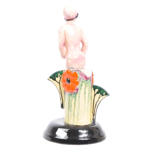 16 - A vintage late 20th century limited edition ceramic figurine of Clarice Cliff by Kevin Francis. The ... 