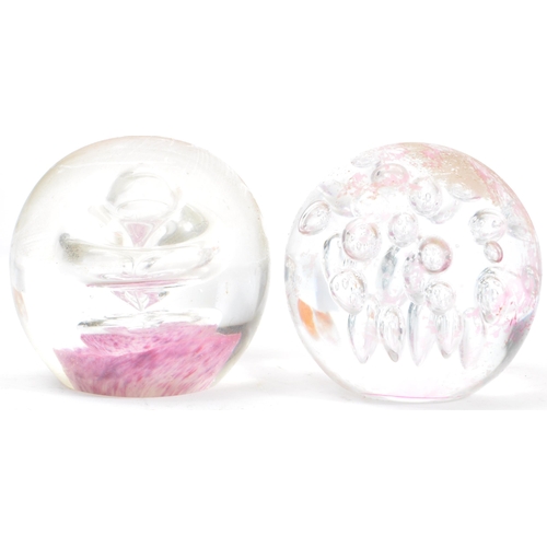 169 - An assortment of five mid century / vintage studio art glass paperweights. Comprising of multi colou... 