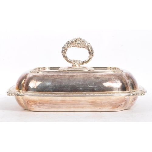 175 - A pair of 20th century silver plated Butler Sheffield entree lidded dishes. Each with a floral shape... 