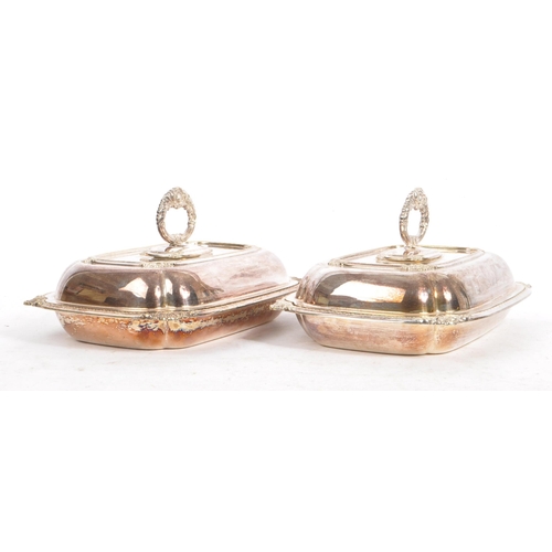 175 - A pair of 20th century silver plated Butler Sheffield entree lidded dishes. Each with a floral shape... 