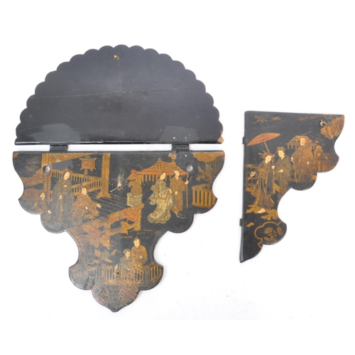 182 - A Japanese Oriental 19th century paper mache on ebonised wood folding wall shelf. The shelf having a... 