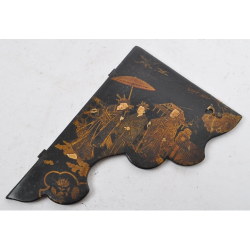 182 - A Japanese Oriental 19th century paper mache on ebonised wood folding wall shelf. The shelf having a... 